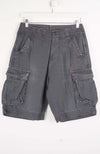 Gray cargo shorts with a Nike logo on a white background