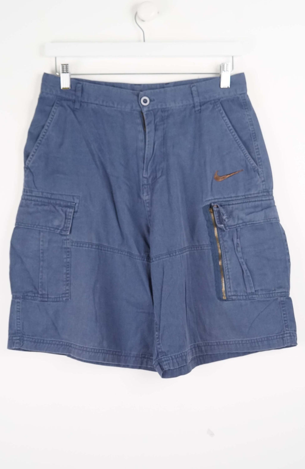 Blue cargo shorts with a brand logo on a white background