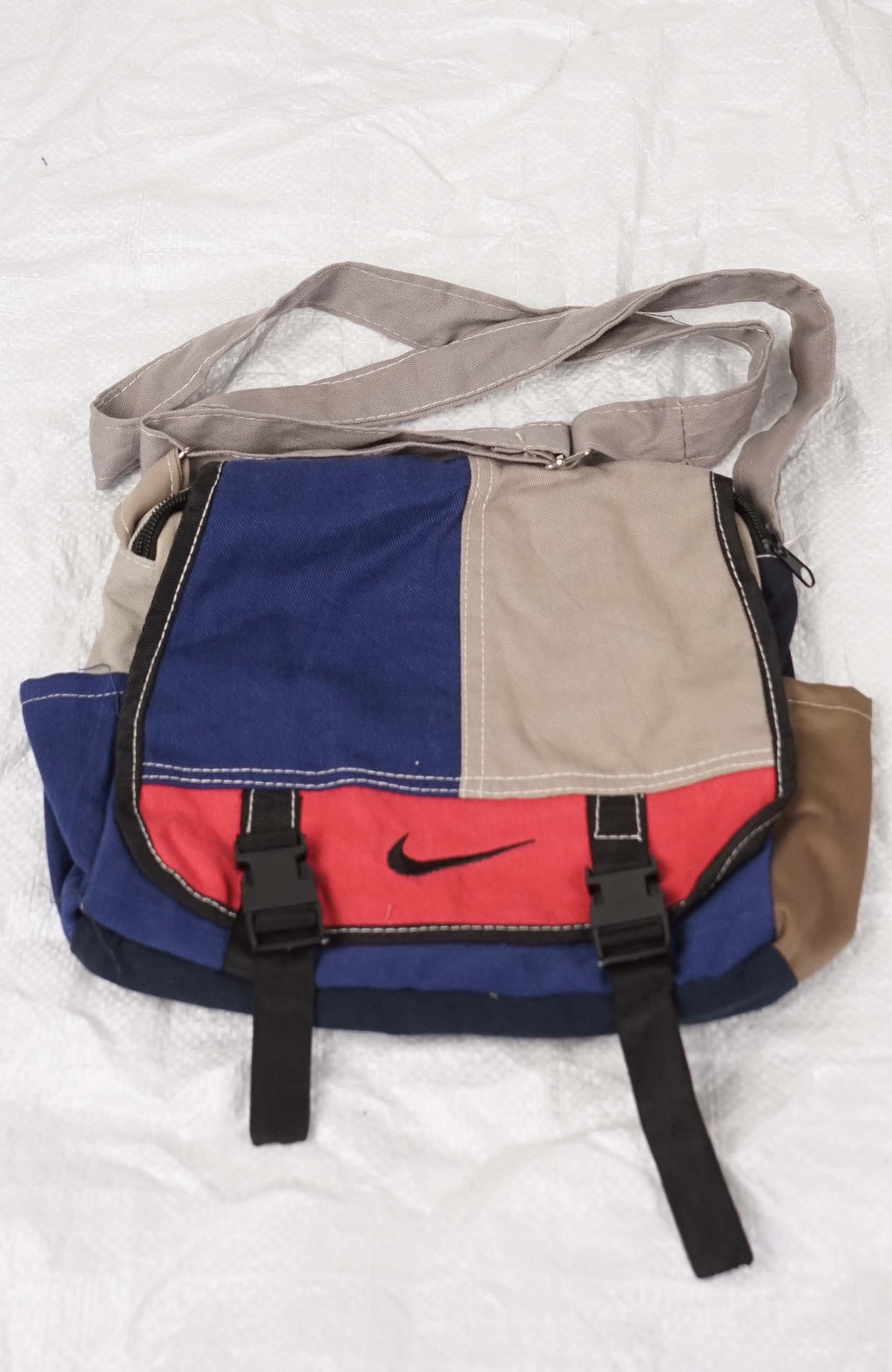 Multicolored bag with a Nike logo on a white background
