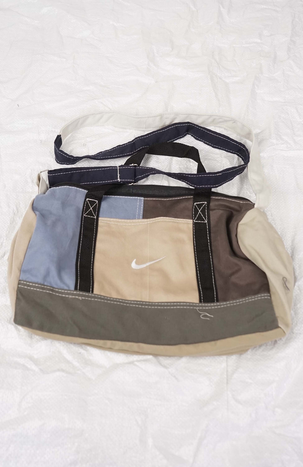 Multicolored bag with Nike logo on a white background