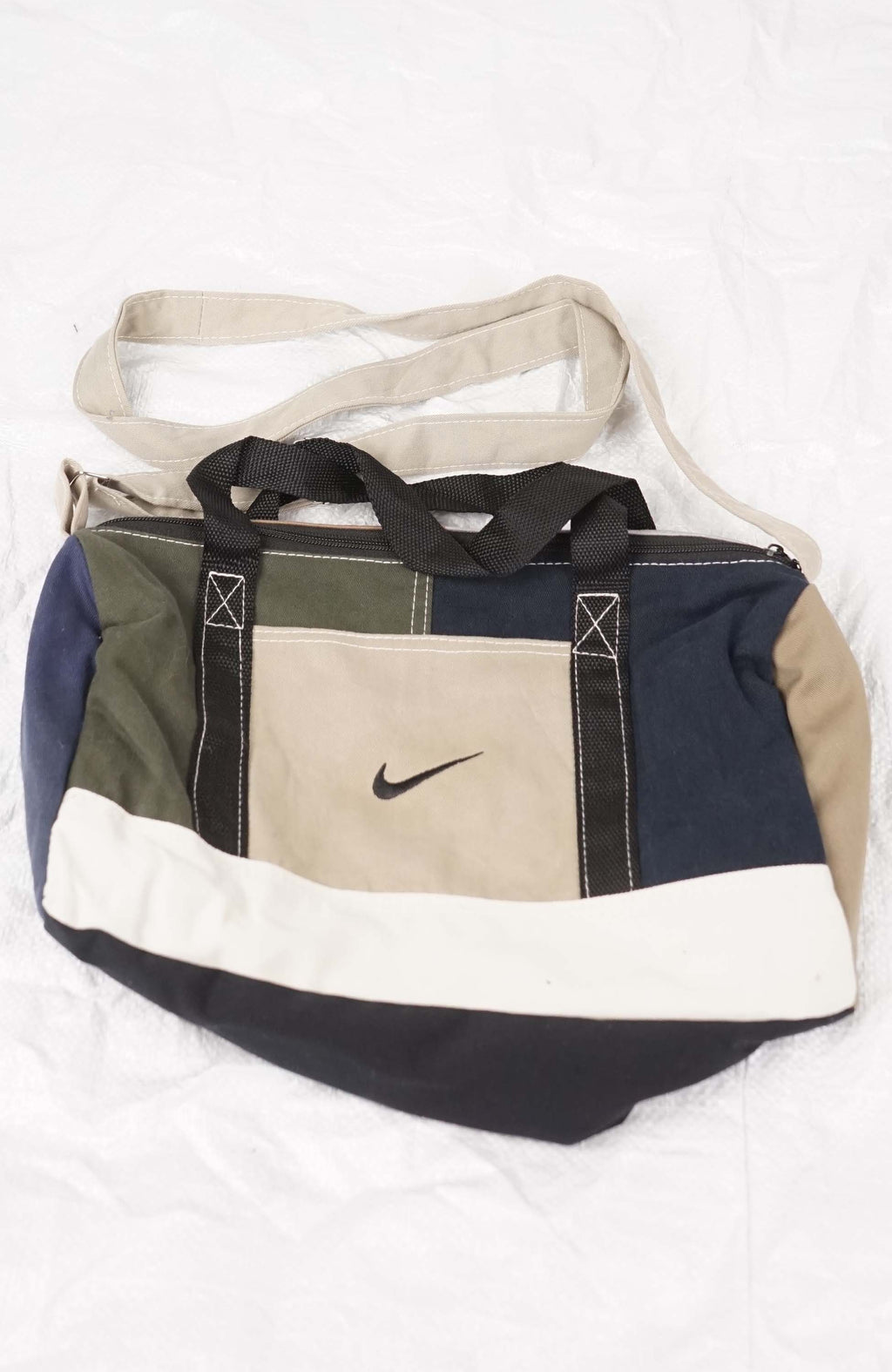 Multicolored bag with a Nike logo on a white background