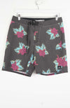 Floral patterned shorts on a white background