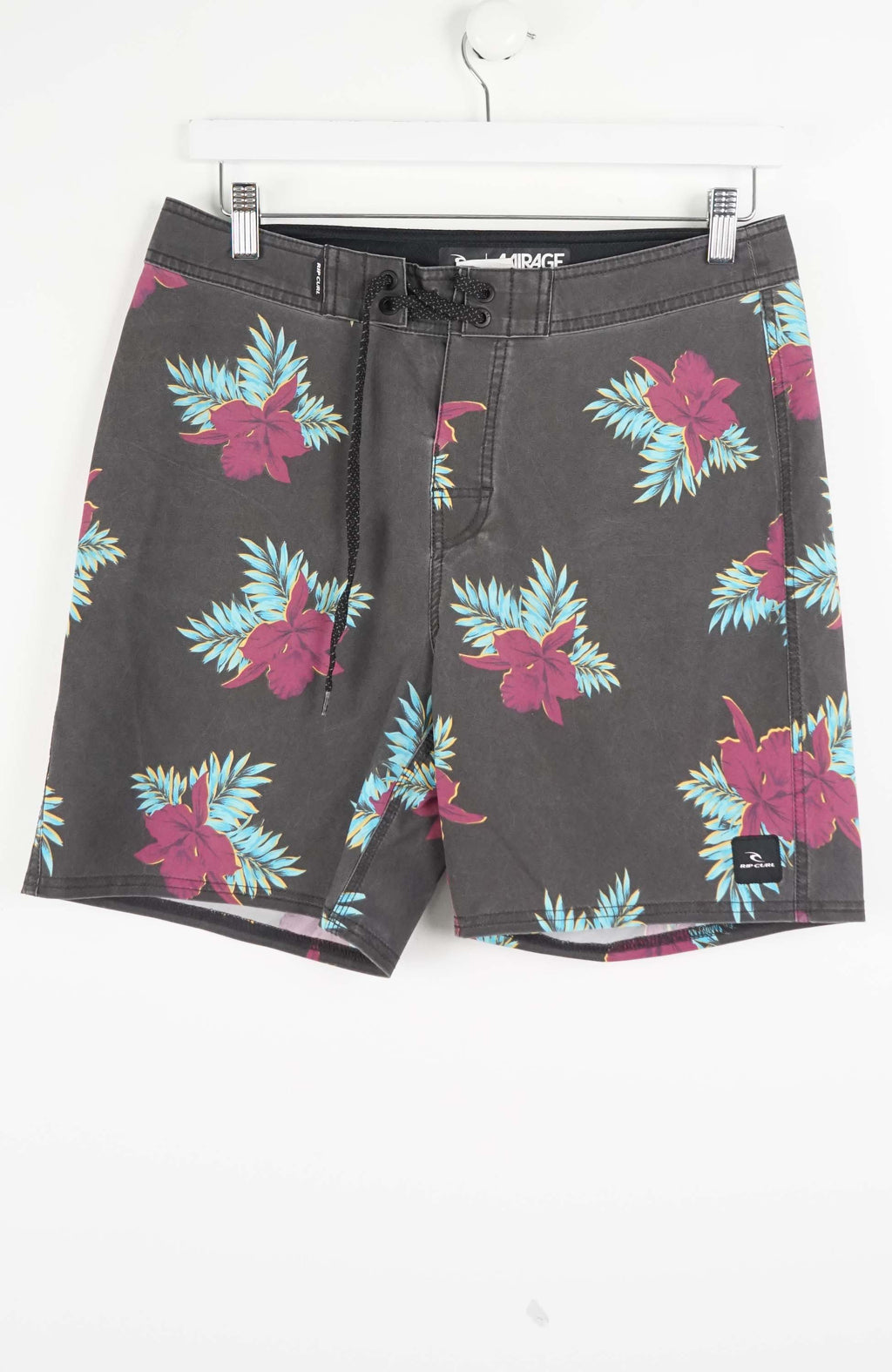 Floral patterned shorts on a white background