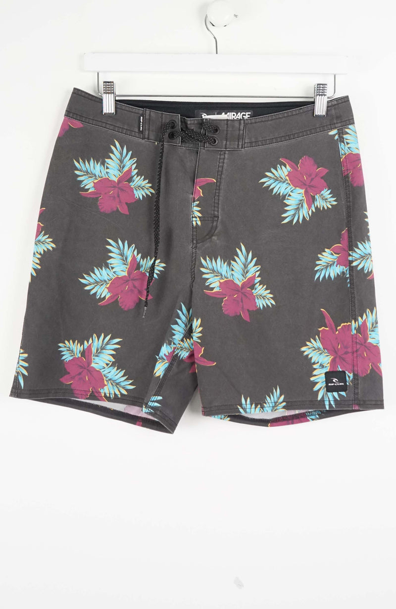 Floral patterned shorts on a white background