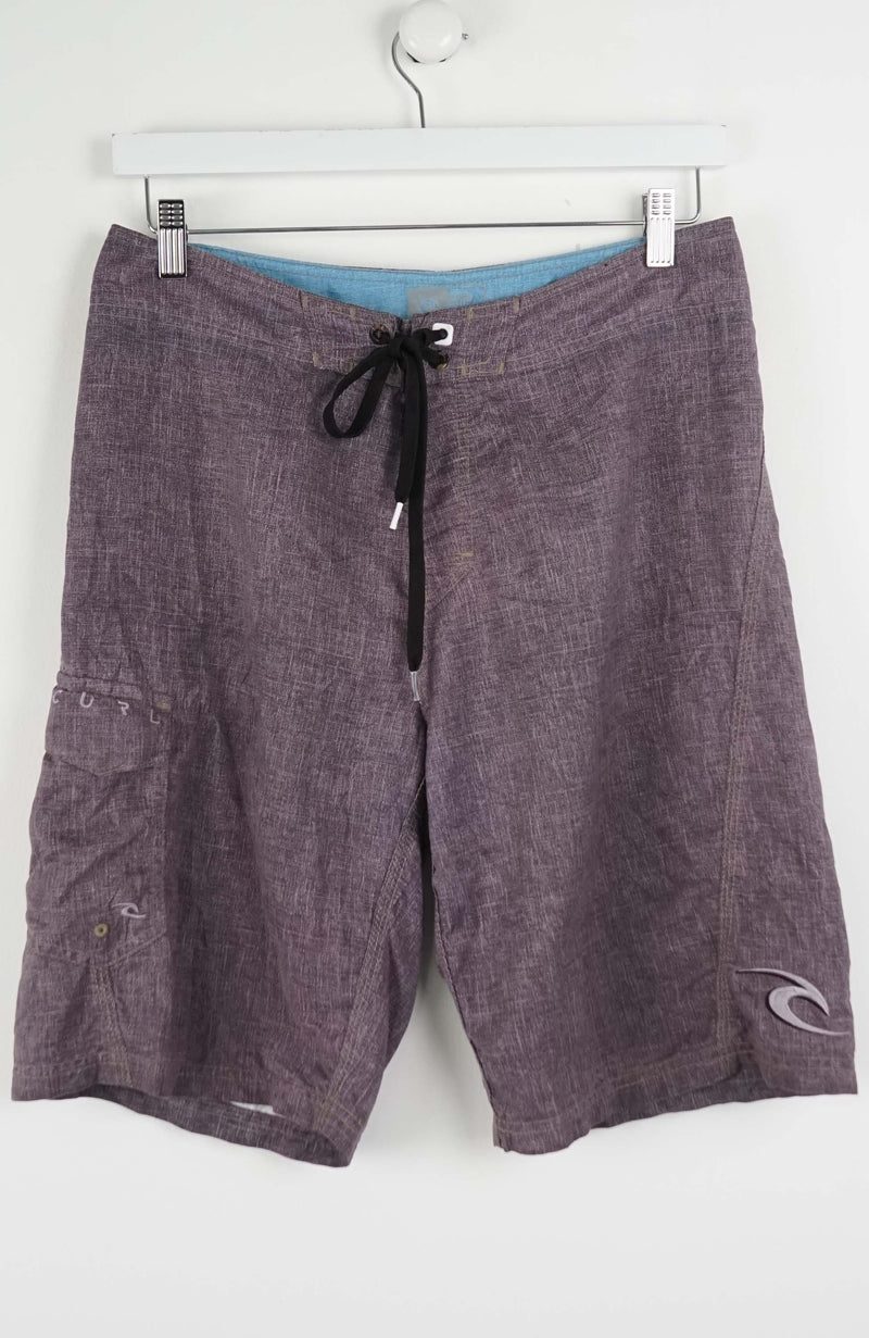 Gray shorts with a black drawstring on a white background