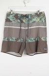 Brown shorts with floral patterns on a white background