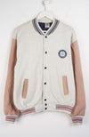 Varsity jacket with beige sleeves and a logo on a white background