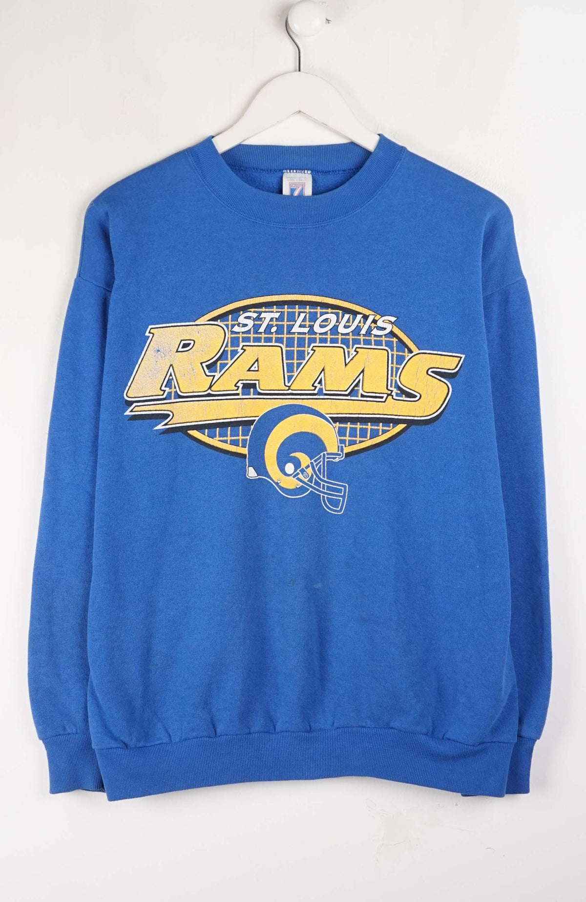 Blue sweatshirt with St. Louis Rams logo on a white background
