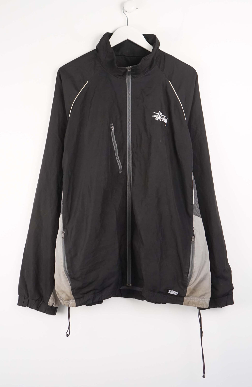 Black jacket with a logo on a white background