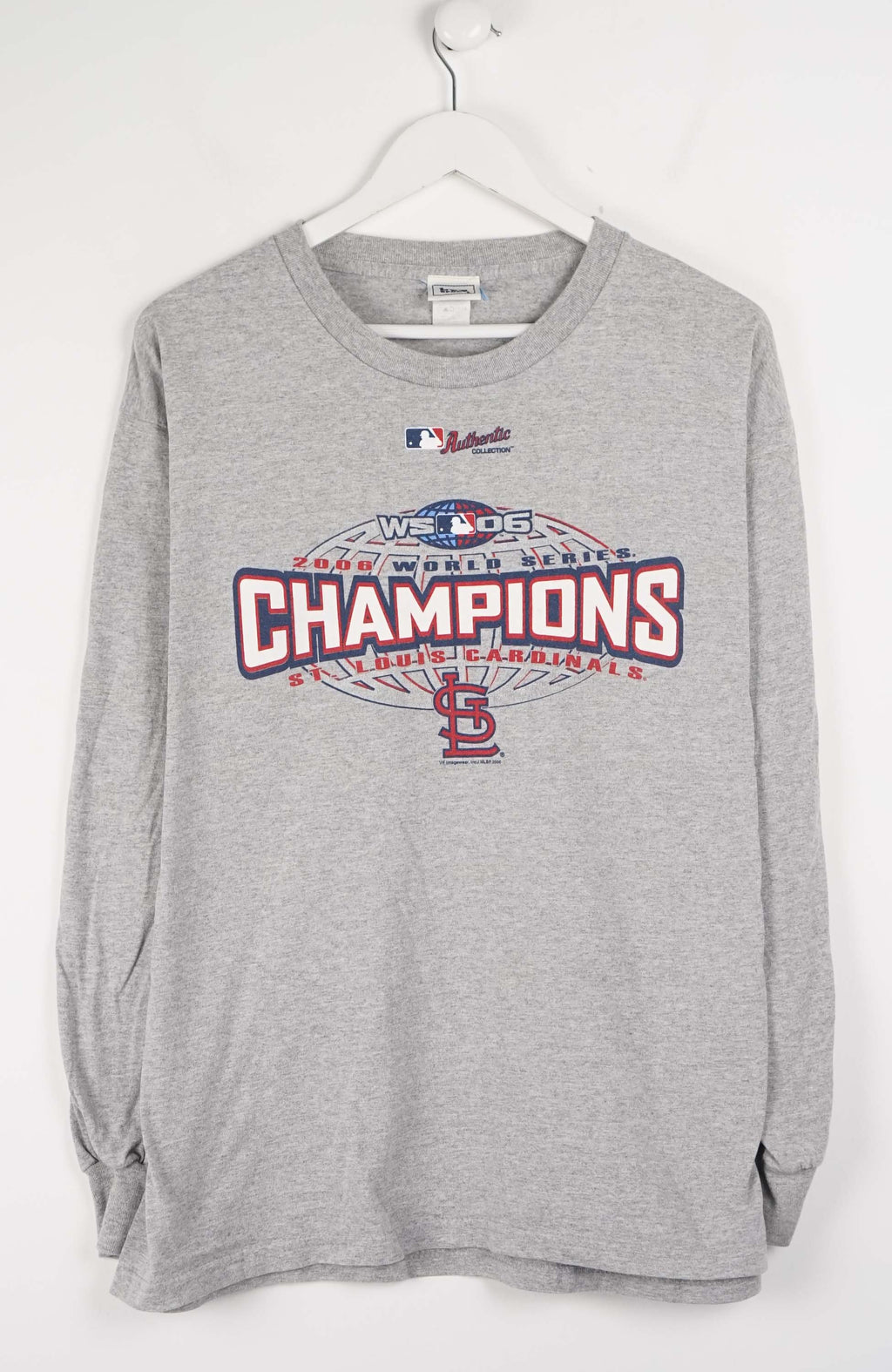 Gray sweatshirt with 'World Series Champions' text and logo on a white background