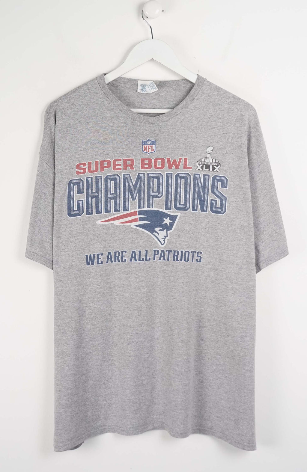 Gray t-shirt with Super Bowl Champions text and logo on a white background
