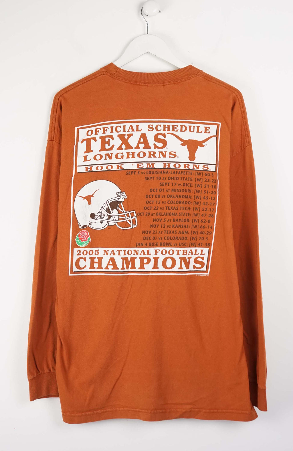 Orange long-sleeve shirt with '2005 National Football Champions Texas Longhorns' text on a white background