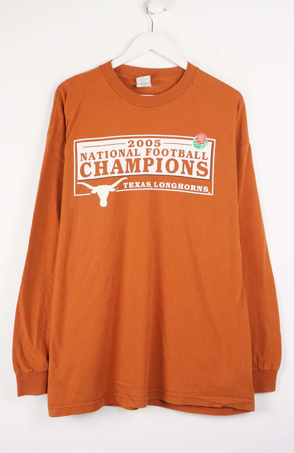 Orange long-sleeve shirt with '2005 National Football Champions Texas Longhorns' text on a white background