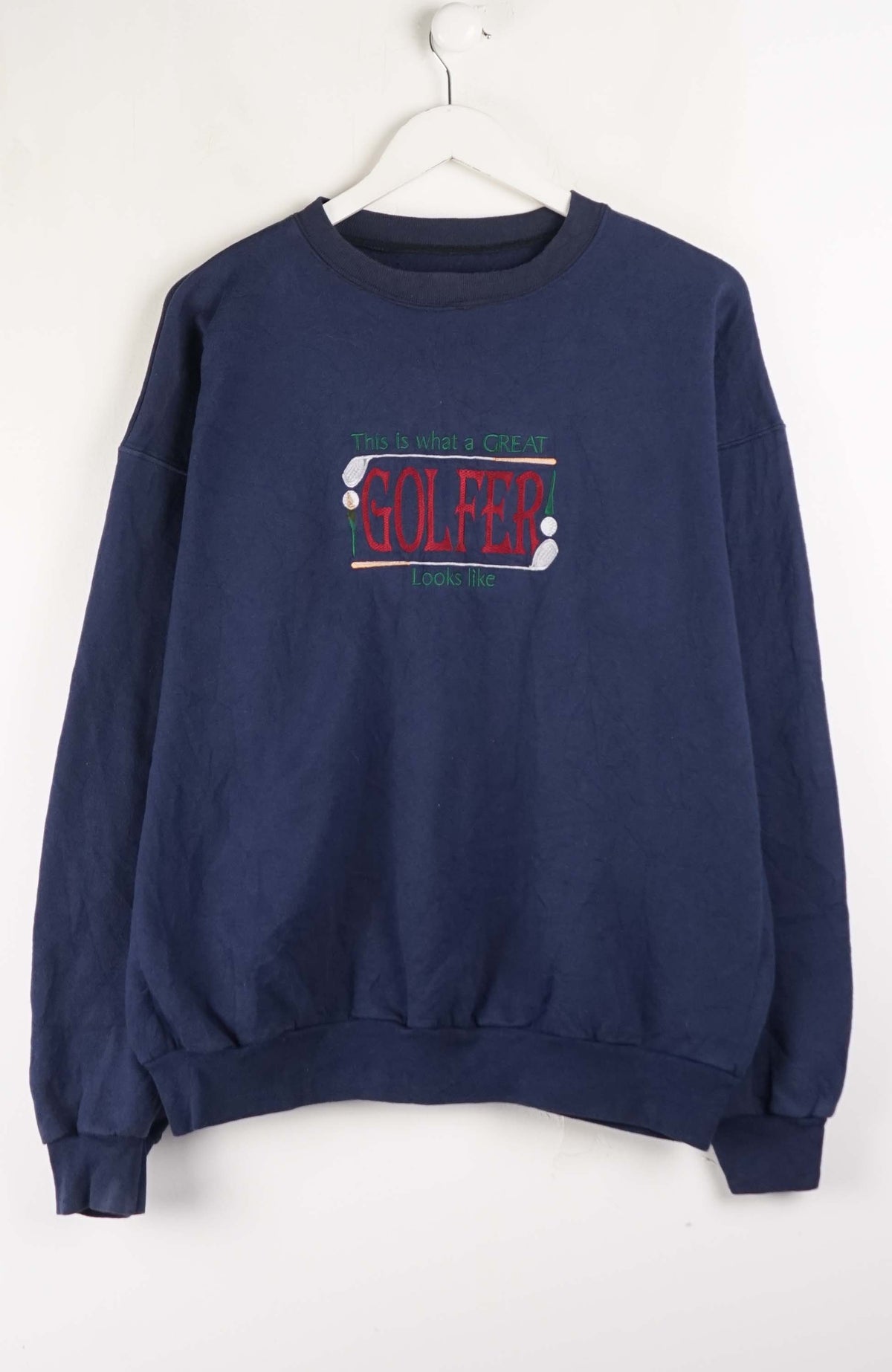 Navy blue sweatshirt with text on a white background