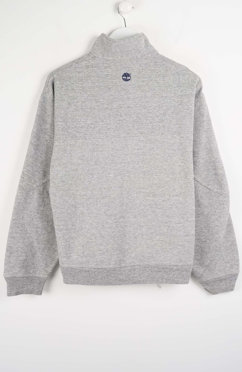 Gray pullover with a brand logo on a white background