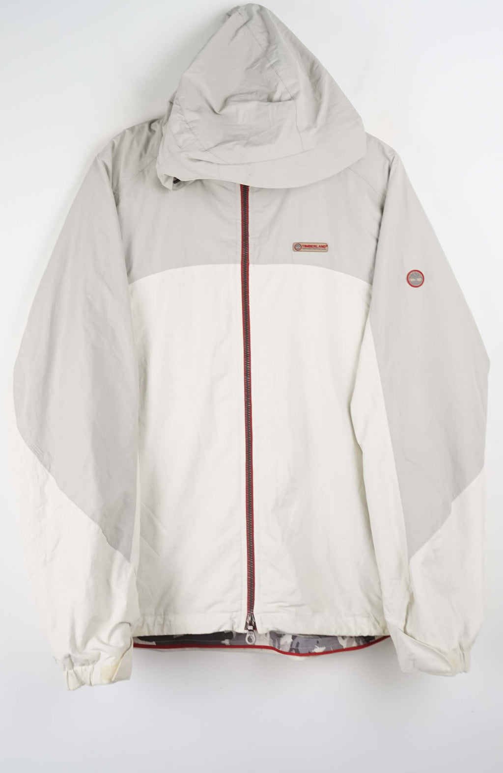 Light gray jacket with a hood on a white background