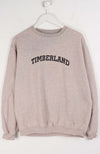 Gray sweatshirt with 'TIMBERLAND' text on a white background