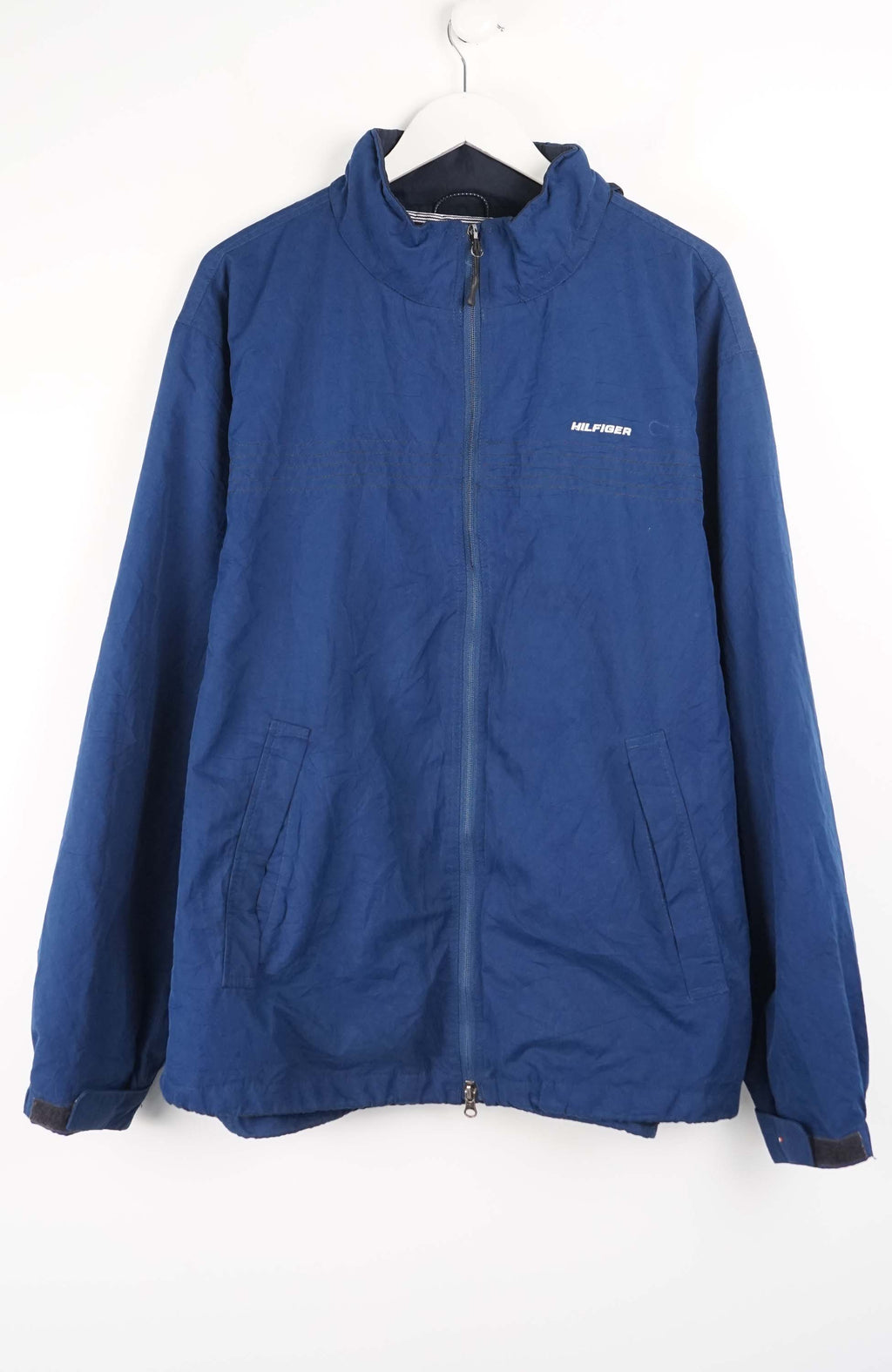 Blue jacket with a brand logo on a white background