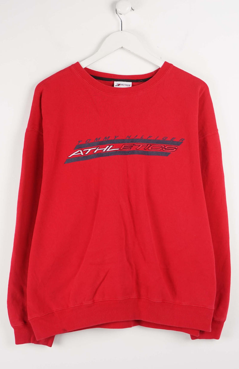 Red sweatshirt with a logo on a white background