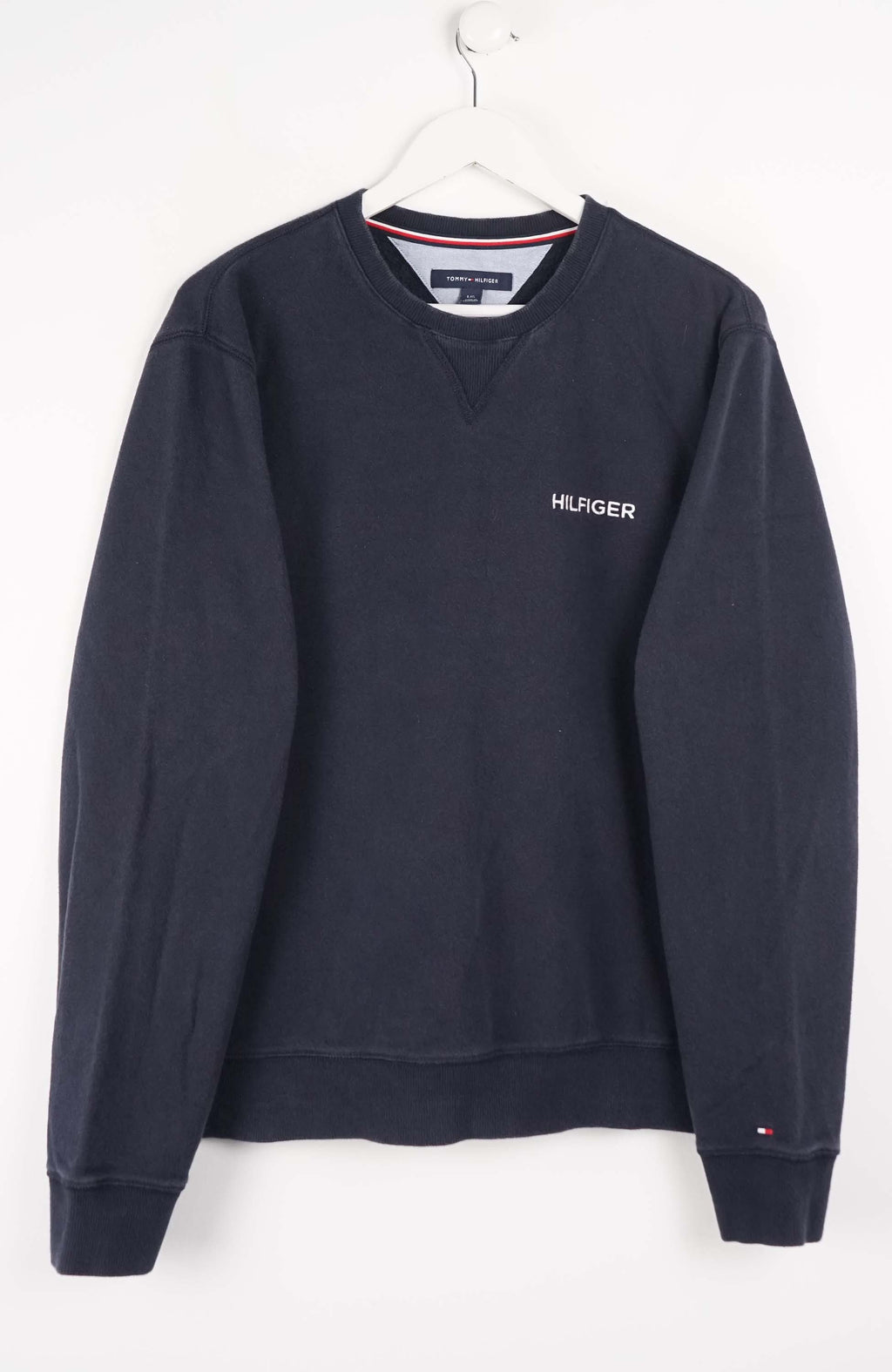 Navy blue Tommy Hilfiger sweatshirt on a white background