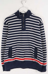Navy and white striped sweater with a red stripe on a hanger against a white background