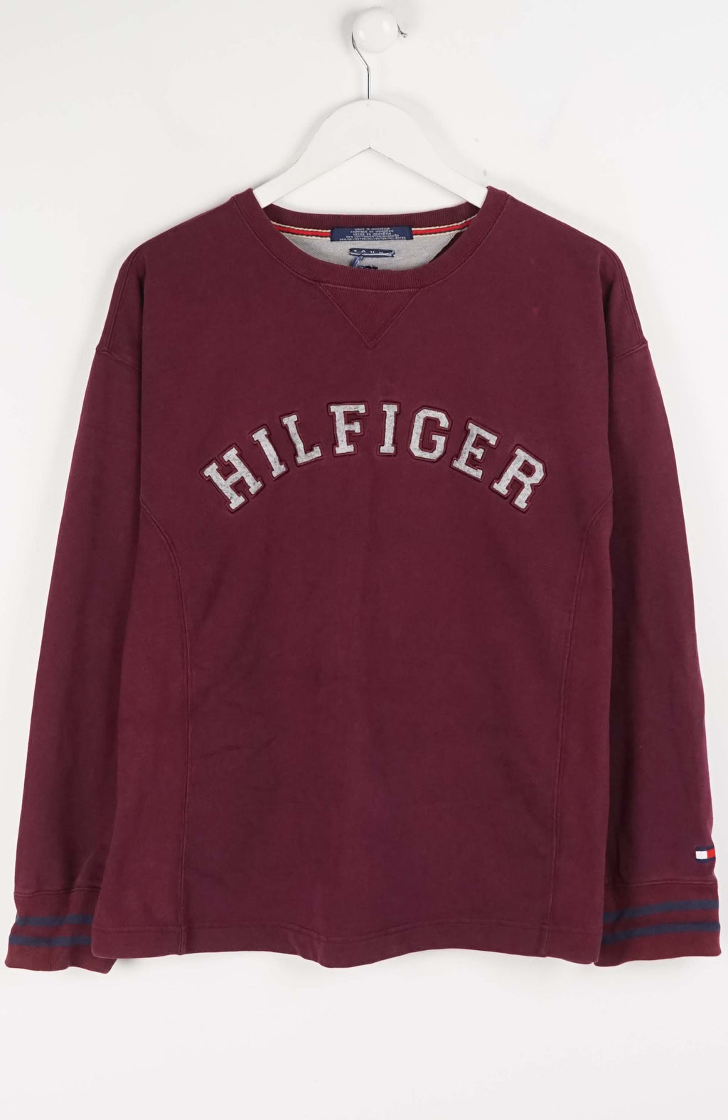 Maroon sweatshirt with 'Hilfiger' logo on a white background