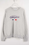 Gray sweatshirt with 'Tommy Girl' logo on a white background