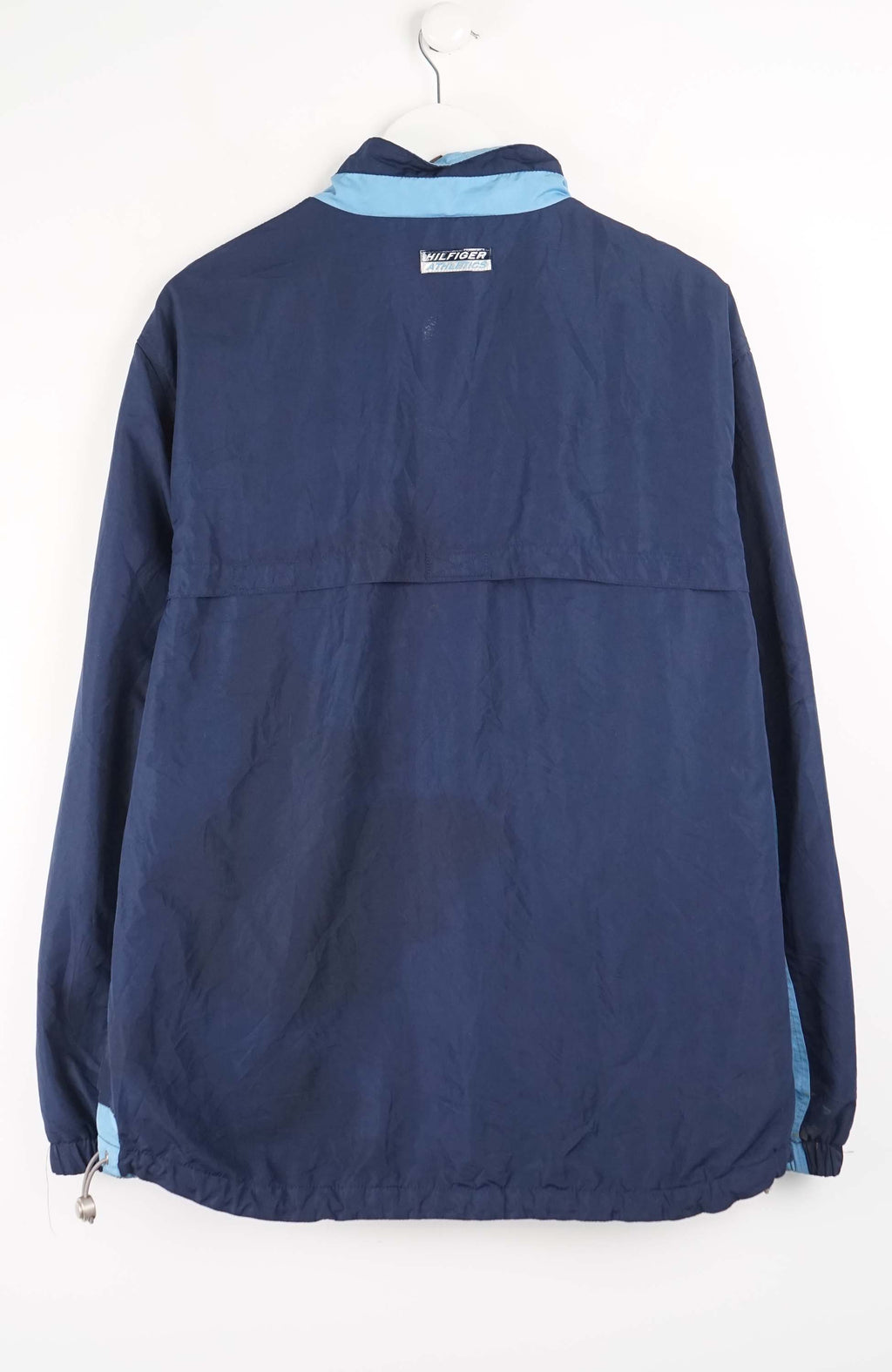 Navy jacket with light blue trim on a white background