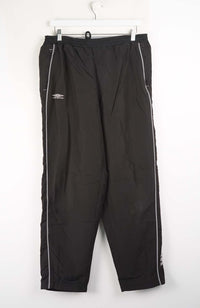 Black pants with white stripes on a white background