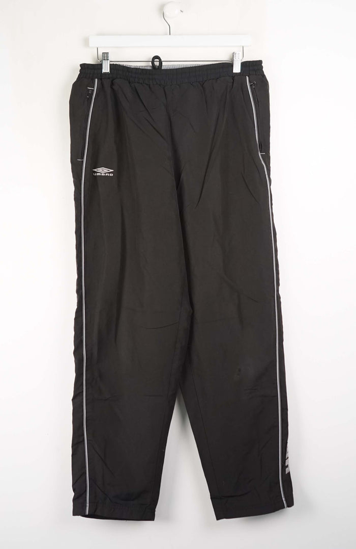 Black pants with white stripes on a white background