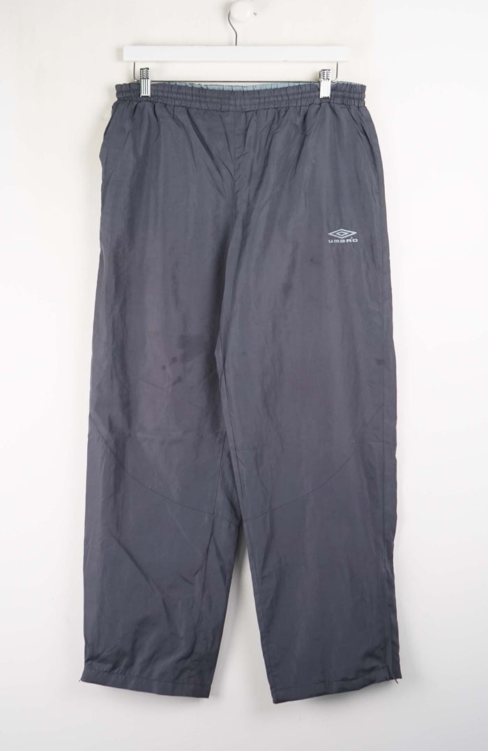 Gray pants with a brand logo on a white background