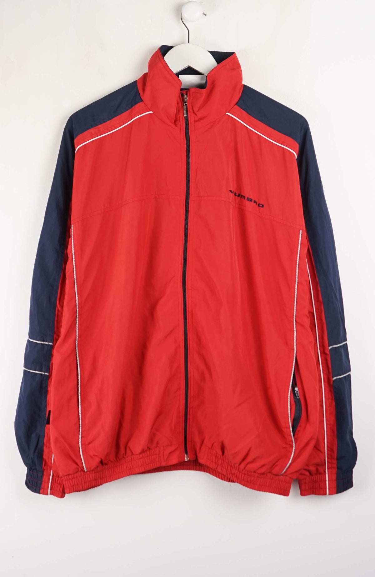 Red and navy jacket with a brand logo on a white background