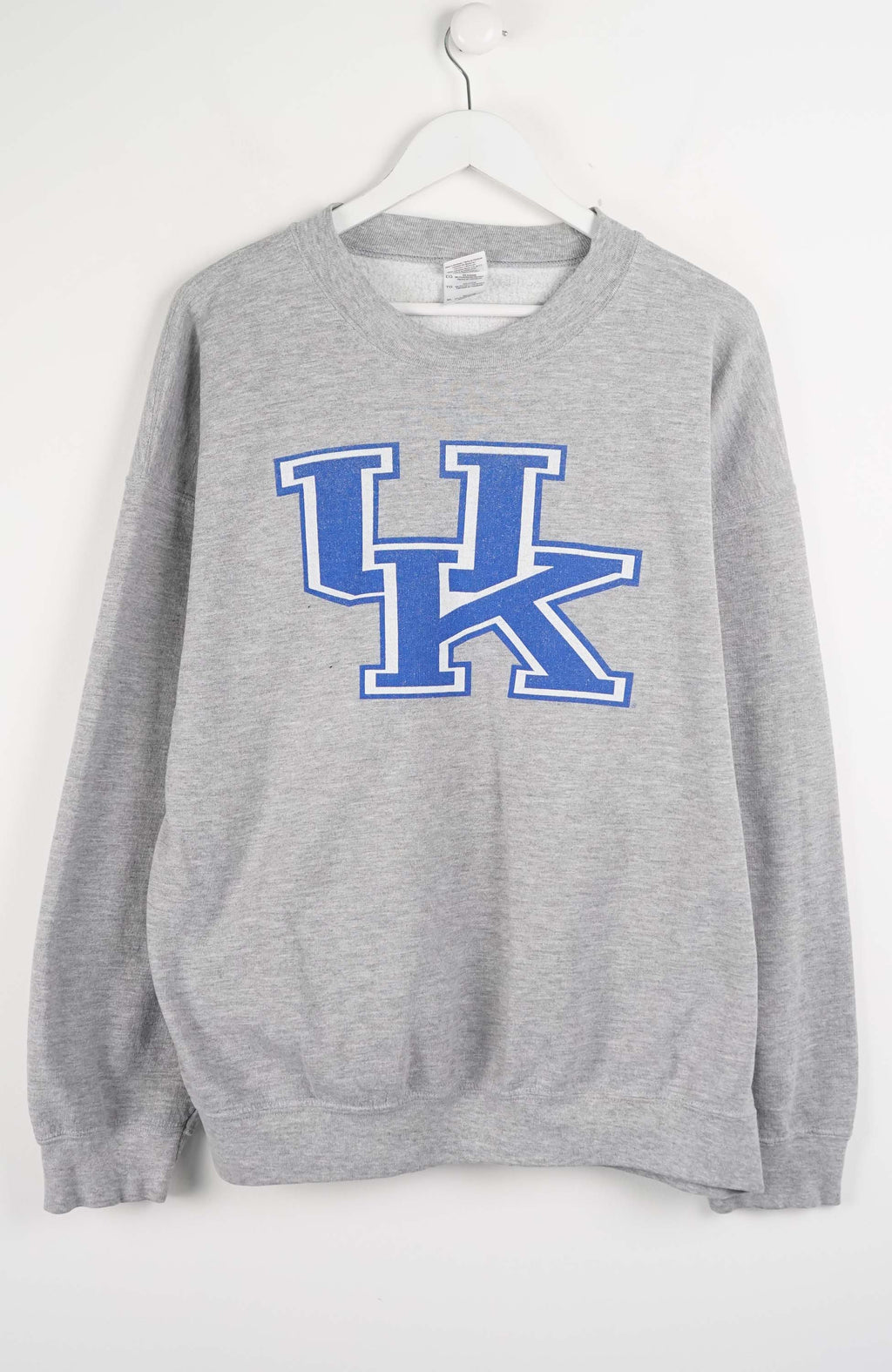 Gray sweatshirt with 'UK' logo on a white background