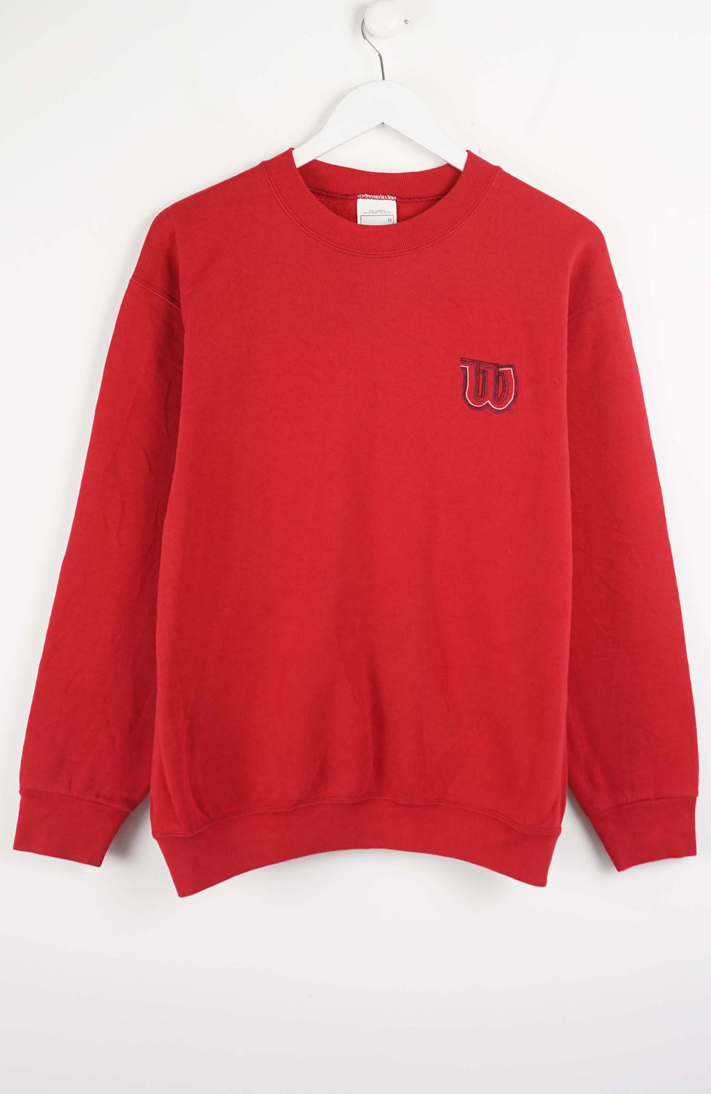 Red sweatshirt with a logo on a white background