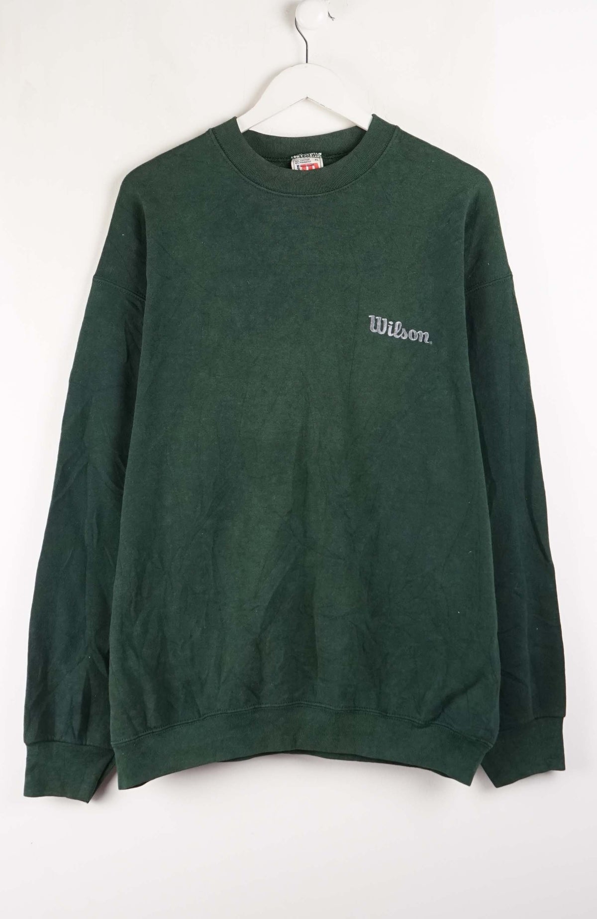 Green sweatshirt with 'Wilson' logo on a white background