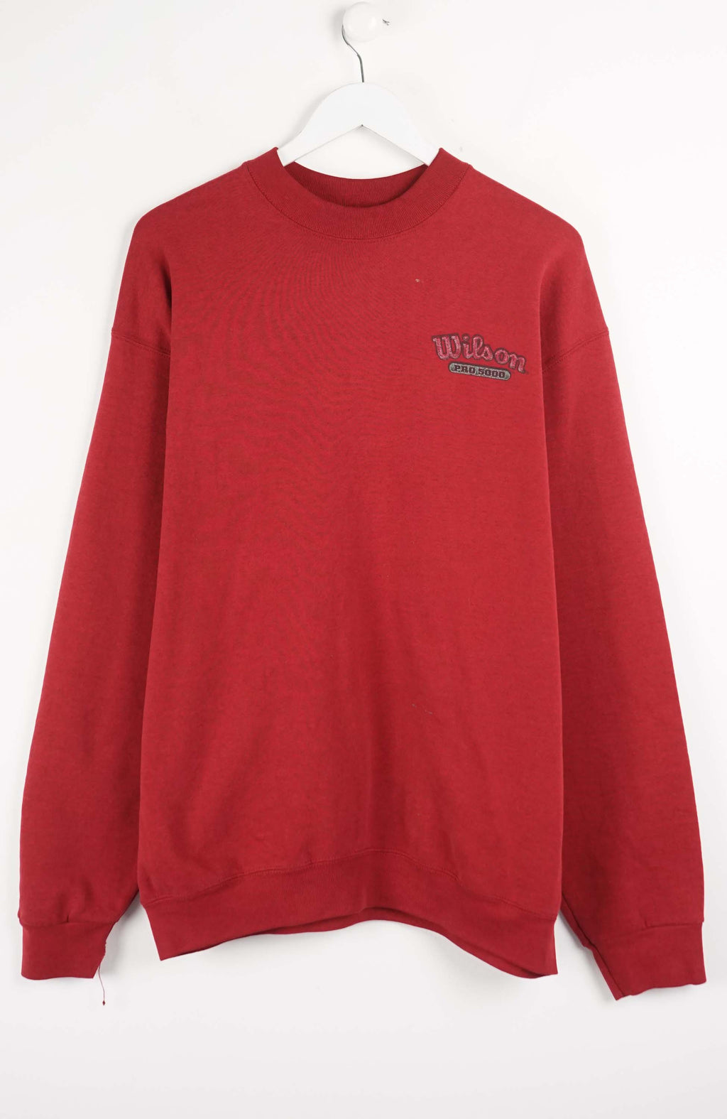 Red sweatshirt with a logo on a white background