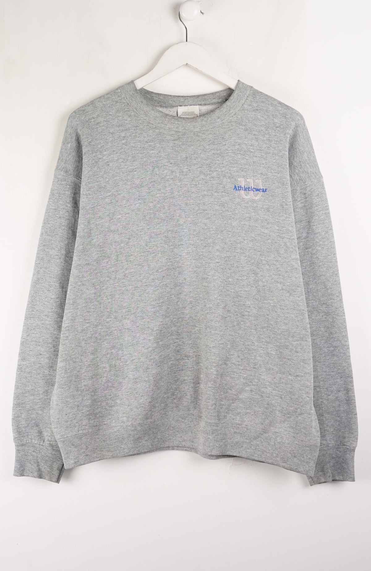 Gray sweatshirt with a small blue logo on a white background