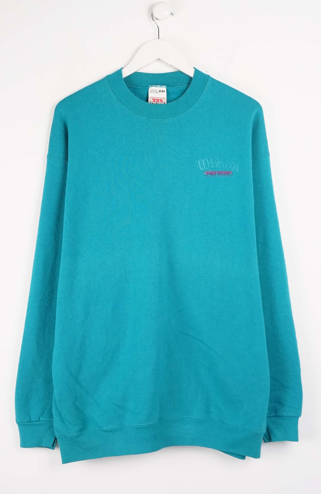 Teal sweatshirt with a small logo on a white background