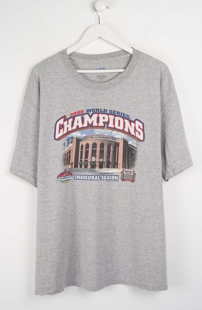 Gray t-shirt with World Series Champions graphic on a white background